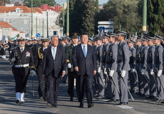 Chinese President Xi Jinping attends a grand welcome ceremony held by Portuguese President Marcelo Rebelo de Sousa in Lisbon, Portugal on Tuesday, December 4, 2018. [Photo: Xinhua]