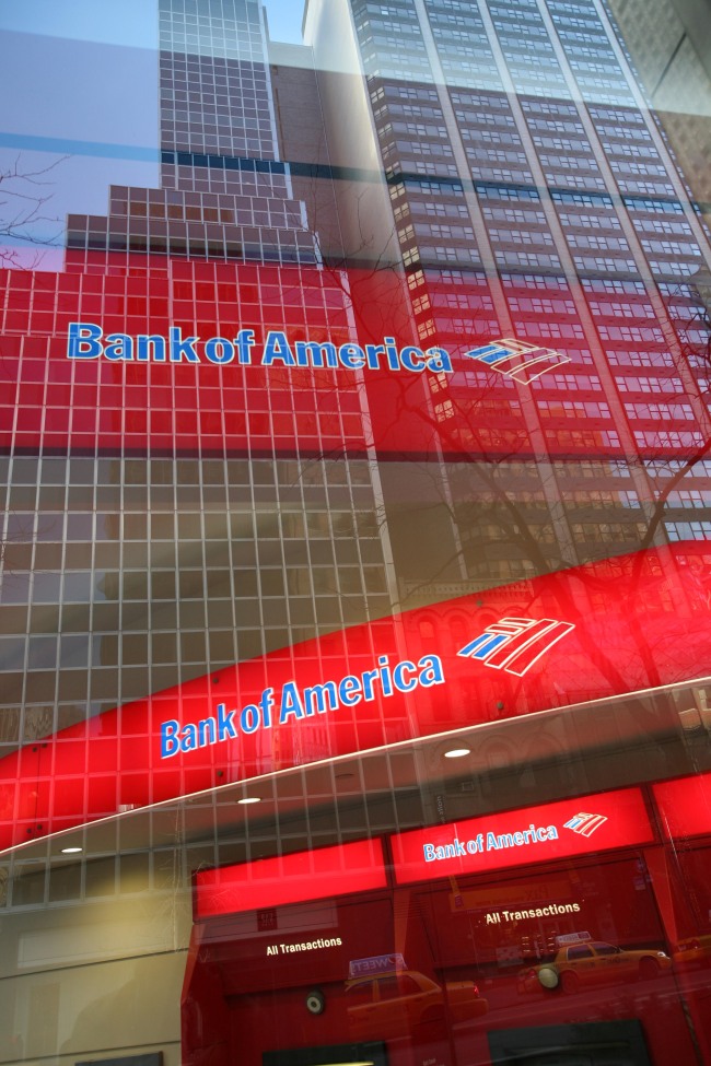 In this Jan. 25, 2009 file photo, a Bank of America branch office is shown in New York. A federal judge said Monday, Feb. 22, 2010, he would reluctantly approve an amended $150 million settlement between the Securities and Exchange Commission and Bank of America to end civil charges accusing the bank of misleading shareholders when it acquired Merrill Lynch. [Photo:AP]