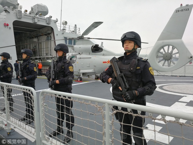 Naval soldiers board a vessel that is setting sail from Zhanjiang, south China's Guangdong Province, on Sunday, December 9, 2018. [Photo: VCG]