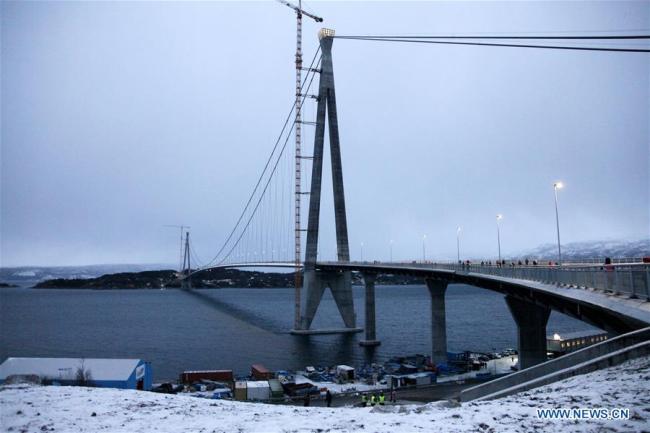 Photo taken on Dec. 9, 2018 shows the Halogaland Bridge near Norway's northern port city of Narvik. A ceremony was held Sunday to officially open Norway's second largest bridge that has been built by a Chinese company and its partners some 220 km inside the Arctic Circle. With a total length of 1,533 meters and a free span of 1,145 meters, the Halogaland Bridge near Norway's northern port city of Narvik is the longest suspension bridge within the Arctic Circle. [Photo: Xinhua] 