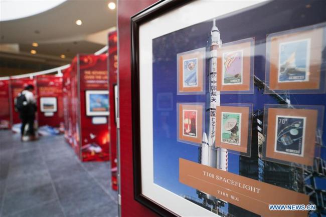 Visitors watch the stamps showing China's science and technology achievements during the "China-Great Change" stamp exhibition in Leuven, Belgium, Dec. 11, 2018. A large-scale stamp exhibition was opened Tuesday at Belgium's University of Leuven to commemorate the 40th anniversary of China's reform and opening up. Themed "China - Great Change", the exhibition, showcasing 188 stamps, aims to offer a glimpse into the significant changes that have transpired in China over the last four decades.[Photo:Xinhua]