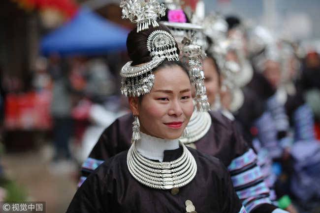 Women in traditional costumes of Dong ethnic group [File photo: VCG]