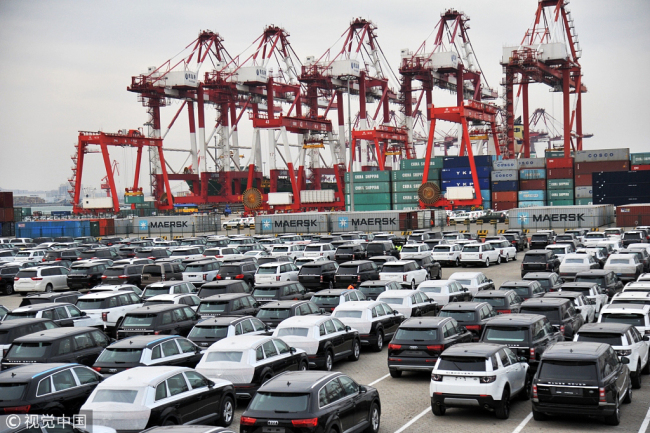 Imported cars stop at the Port of Qingdao on Feb. 23, 2016. [Photo: VCG]