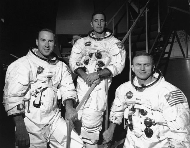 In this Dec. 18, 1968, file photo, Apollo 8 astronauts, from left, James Lovell, command module pilot; William Anders, lunar module pilot; and Frank Borman, commander, stand in front of mission simulator prior to training in exercise for their scheduled six-day lunar orbital mission at the Kennedy Space Center in Florida. [File photo: AP]