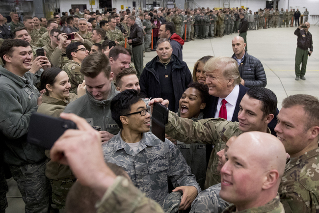 President Donald Trump and first lady Melania Trump greet members of the military at Ramstein Air Base, Germany, Thursday, Dec. 27, 2018. [Photo: AP/Andrew Harnik]