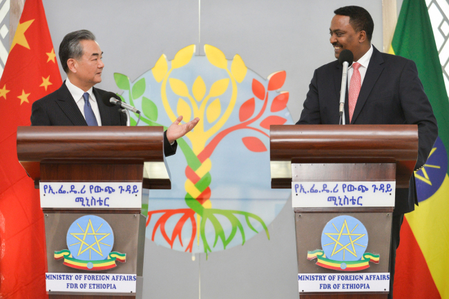 China's Foreign Minister Wang Yi (L) and Ethiopia's Foreign Minister Workneh Gebeyehu (R) speak during a joint press conference in Addis Ababa, on January 3, 2019, during Yi's official visit Ethiopia. [Photo: AFP/Michael Tewelde]