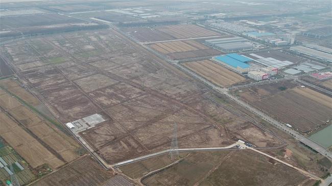 Aerial photo taken on Jan. 3, 2018 shows a tract of land for Tesla Shanghai Gigafactory in Lingang Area in Shanghai, east China. [Photo: Xinhua]