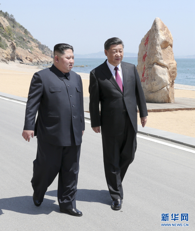 Xi Jinping, general secretary of the Central Committee of the Communist Party of China (CPC) and Chinese president, meets with Kim Jong Un, chairman of the Workers' Party of Korea (WPK) and chairman of the State Affairs Commission of the Democratic People's Republic of Korea (DPRK), in Dalian, northeast China's Liaoning Province, on May 7-8, 2018. [File photo: Xinhua]