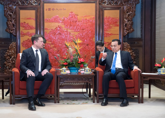 Chinese Premier Li Keqiang meets with Tesla CEO Elon Musk on January 9, 2019. [Photo: gov.cn]