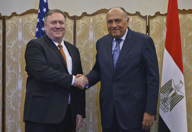 U.S. Secretary of State Mike Pompeo, left, shakes hands with Egyptian Foreign Minister Sameh Shoukry following their meeting, at the ministry of foreign affairs in Cairo, Egypt, Thursday, January 10, 2019. [Photo: AP]