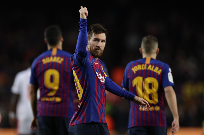 FC Barcelona's Lionel Messi, centre, celebrates after scoring his side's second goal during the Spanish La Liga soccer match between FC Barcelona and Eibar at the Camp Nou stadium in Barcelona, Spain, Sunday, Jan. 13, 2019. [Photo: AP]