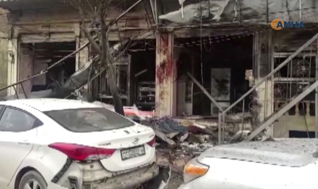 This frame grab from video provided by Hawar News, ANHA, the news agency for the semi-autonomous Kurdish areas in Syria, shows a damaged restaurant where an explosion occurred, in Manbij, Syria, Wednesday, Jan. 16, 2019. The Britain-based Syrian Observatory for Human Rights, a Syrian war monitoring group, and a local town council said Wednesday that the explosion took place near a patrol of the U.S.-led coalition and that there are casualties. [Photo: ANHA via AP]
