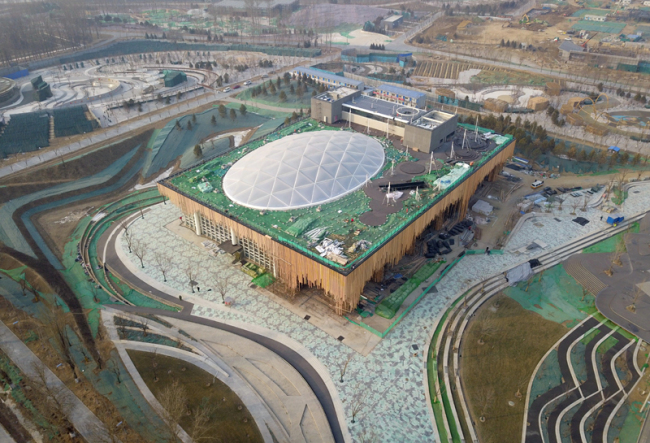 An Aerial photo taken by a drone on January 19, 2019 shows the Plant Pavilion in 2019 International Horticultural Exhibition site in Yanqing District, Beijing. [Photo: Xinhua]