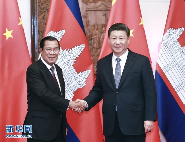 Chinese President Xi Jinping meets with visiting Cambodian Prime Minister Samdech Techo Hun Sen at the Diaoyutai State Guesthouse in Beijing on January 21, 2019. [Photo: Xinhua]