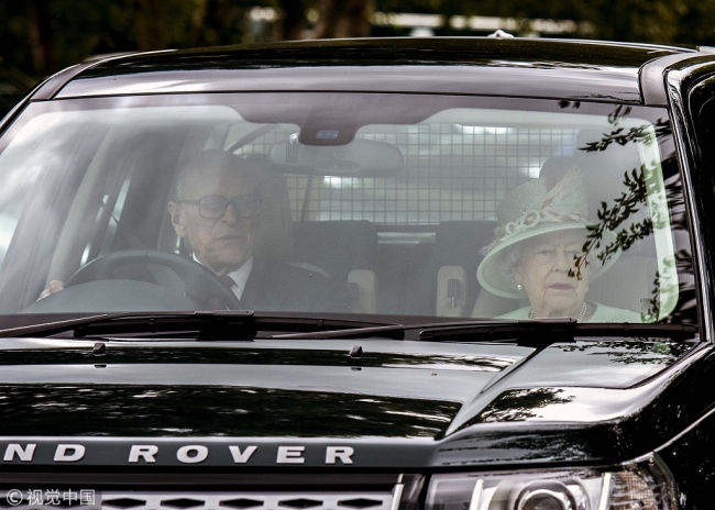 Prince Philip Duke of Edinburgh driving his Land Rover Freelander car with The Queen, Queen Elizabeth II as a passenger on 25th June 2017 to the Guards Polo Club in Egham England UK.[File Photo:VCG]