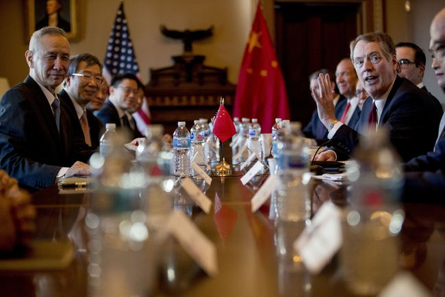 Chinese Vice Premier Liu He, left, and US Trade Representative Robert Lighthizer, right, sit across the table as they begin US-China Trade Talks in the Diplomatic Room of the Eisenhower Executive Office Building on the White House Complex, Wednesday, Jan. 30, 2019, in Washington. [Photo: AP]