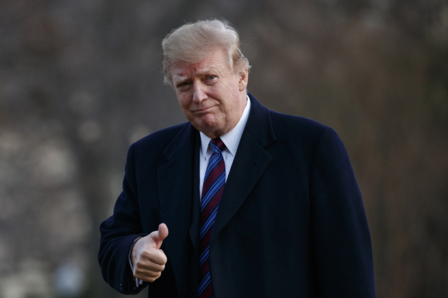 U.S. President Donald Trump gives a thumbs-up after arriving on Marine One on the South Lawn of the White House in Washington, Friday, Feb. 8, 2019. The President was returning to the White House after his annual physical exam at Walter Reed National Military Medical Center. [Photo: AP/Carolyn Kaster]
