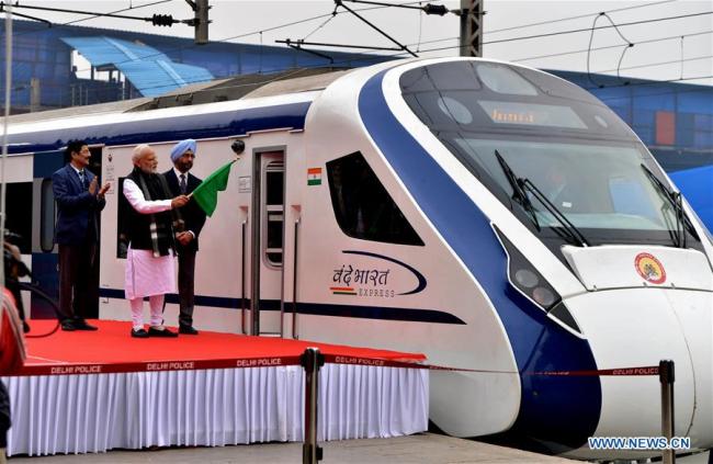 Indian Prime Minister Narendra Modi flags off the country's first semi high speed train, Vande Bharat Express, at New Delhi railway station in India, on Feb. 15, 2019. [Photo: Xinhua/Partha Sarkar]