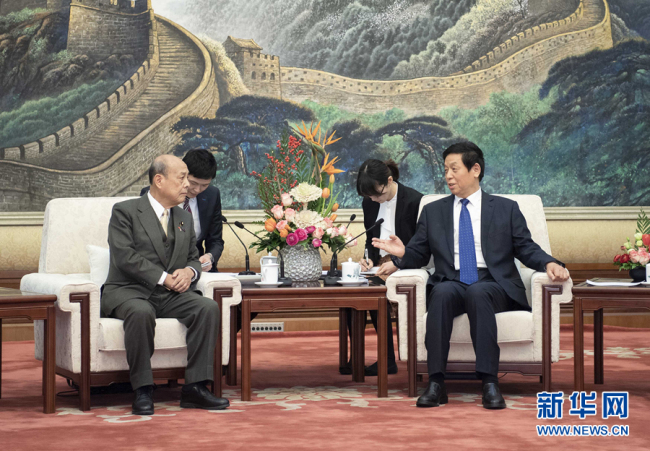 Li Zhanshu, chairman of the National People's Congress Standing Committee, meets with a delegation consisting of several members of Japan's House of Councillors in Beijing on Monday, February 18, 2019. [Photo: Xinhua]