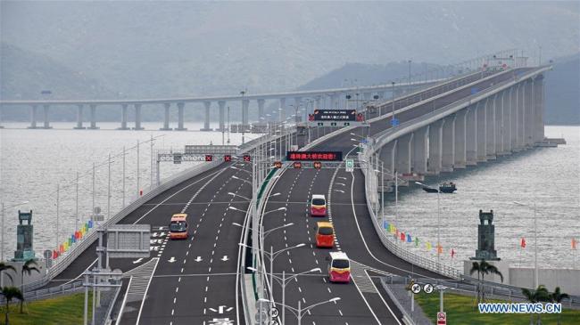 Cars run on the Hong Kong-Zhuhai-Macao Bridge, Oct. 24, 2018. [Photo: Xinhua/Liang Xu]