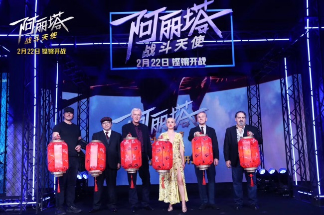 James Cameron (3rd from left), producer of Alita: Battle Angel, leads the main cast including actress Rosa Salazar who plays Alita (3rd from right) to attend a promotional event following the premiere of this sci-fi epic in China on Monday evening, Feb 18, 2019. [Photo provided to China Plus]
