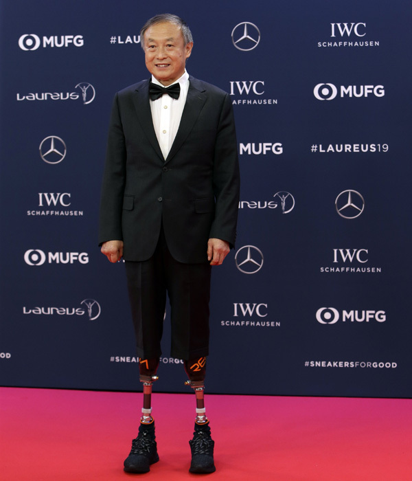 China's Xia Boyu, a double amputee who climbed Mount Everest, winner of the Laureus Sporting Moment of the Year celebrates at the 2019 Laureus World Sports Awards, Monday, Feb. 18, 2019. [Photo: AP]