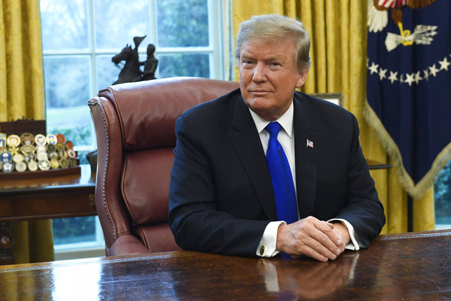 In this Friday, Feb. 22, 2019, file photo, President Donald Trump listens during his meeting with Chinese Vice Premier Liu He in the Oval Office of the White House in Washington. Trump said Sunday he will extend a deadline to escalate tariffs on Chinese imports, citing "substantial progress" in weekend talks between the two countries. [Photo: AP]