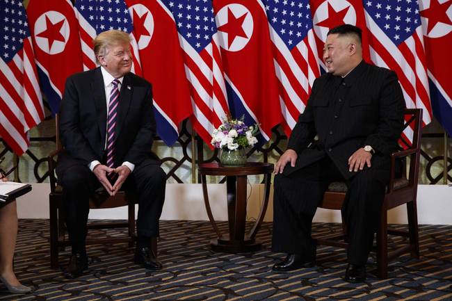 U.S. President Donald Trump sits with North Korean leader Kim Jong Un, Wednesday, Feb. 27, 2019, in Hanoi. [Photo：AP/Evan Vucci]