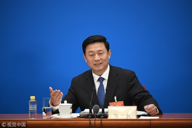 Guo Weimin, spokesperson for the second session of the 13th National Committee of Chinese People's Political Consultative Conference (CPPCC), speaks during a press conference at the Great Hall of the People in Beijing, on Saturday, March 2, 2019. [Photo: VCG]