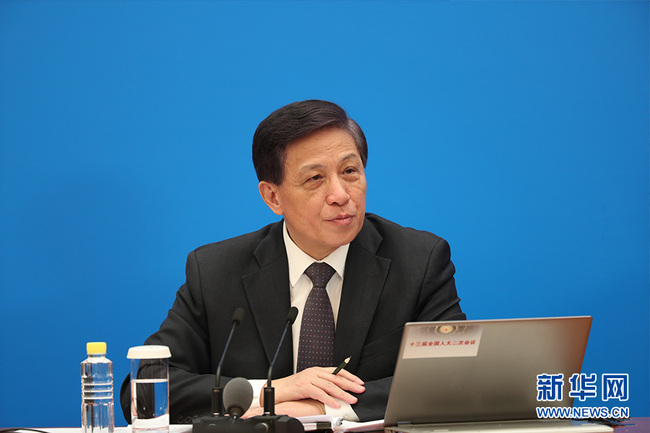 Zhang Yesui, speaksperson of the National People's Congress (NPC), China's top legislature, at a news conference in Beijing on Monday, March 4, ahead of the start of its annual session. [Photo: Xinhua]