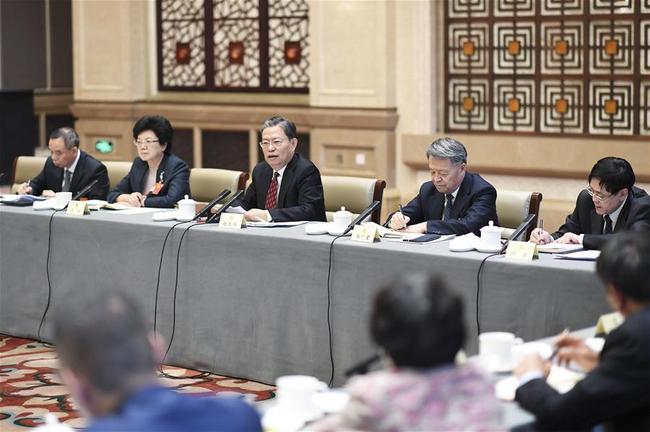 Zhao Leji, a member of the Standing Committee of the Political Bureau of the Communist Party of China (CPC) Central Committee and secretary of the CPC Central Commission for Discipline Inspection, joins a panel discussion with political advisors from the Communist Youth League of China, the All-China Federation of Trade Unions, the All-China Women's Federation and the All-China Youth Federation at the second session of the 13th National Committee of the Chinese People's Political Consultative Conference (CPPCC) in Beijing, capital of China, March 4, 2019. [Photo: Xinhua/Yin Bogu]