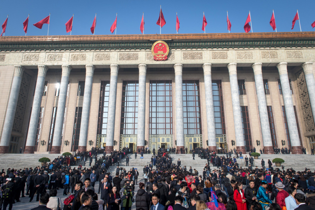 Journalists wait outside the Great Hall of the People on March 5, 2019. [Photo: IC]
