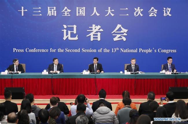 China's Minister of Commerce Zhong Shan (C), Vice Minister of Commerce and Deputy China International Trade Representative Wang Shouwen (2nd R) and Vice Minister of Commerce Qian Keming (2nd L) attend a press conference on China's domestic market and all-round opening-up for the second session of the 13th National People's Congress (NPC) in Beijing on March 9, 2019. [Photo: Xinhua/Shen Bohan]
