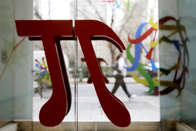 A door handle in the shape of pi is seen at the new National Museum of Mathematics in New York, Dec. 17, 2012. [File photo: IC]