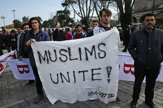 Demonstrators protest against the mosque attacks in New Zealand during a protest in Istanbul, Saturday, March 16, 2019. World leaders expressed condolences and condemnation following the deadly attacks on mosques in the New Zealand city of Christchurch, while Muslim leaders said the mass shooting was evidence of a rising tide of violent anti-Islam sentiment. [Photo: AP/Lefteris Pitarakis]