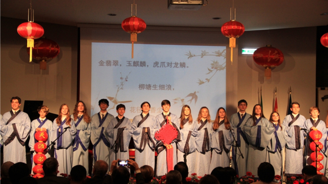 Students from Convitto Nazionale "Vittorio Emanuele II" di Roma read Chinese poems to celebrate the Chinese Lunar New Year in Rome, Italy, Feb. 23, 2018. [Photo:cri.cn]