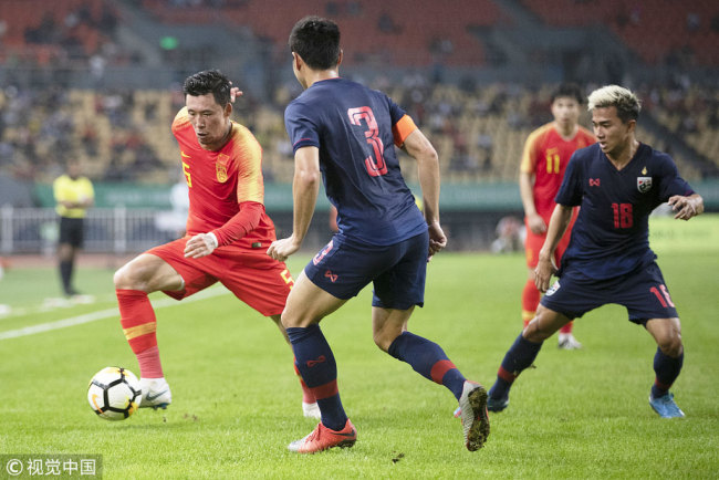 Zhang Linpeng #5 of China in action during 2019 China Cup International Football Championship between China and Thailand at Guangxi Sports Center on March 21, 2019 in Nanning, China. [Photo: Getty Images/Fred Lee]