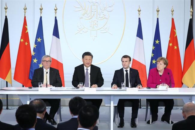 Chinese President Xi Jinping (2nd L), French President Emmanuel Macron (2nd R), German Chancellor Angela Merkel (1st R) and European Commission President Jean-Claude Juncker attend the closing ceremony of a global governance forum co-hosted by China and France in Paris, France, March 26, 2019. (Photo: Xinhua/Ju Peng)