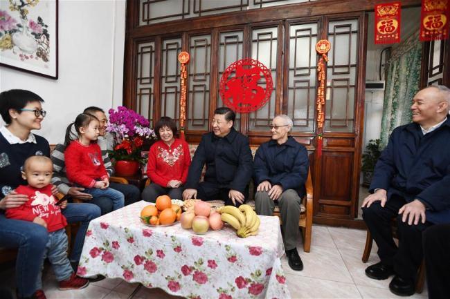 Chinese President Xi Jinping comes to residents' homes and talks with them in Qianmen area in central Beijing, capital of China, Feb. 1, 2019. President Xi Jinping on Friday visited residents and primary-level officials in Beijing and extended Lunar New Year greetings to Chinese people of all ethnic groups. [Photo: Xinhua]