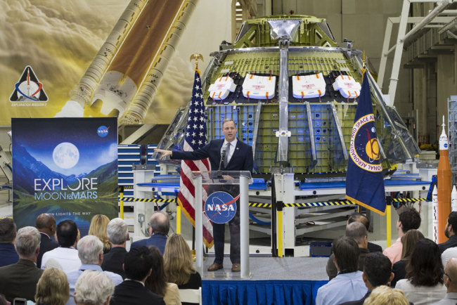 NASA Administrator Jim Bridenstine talks to employees about the agency's progress toward sending astronauts to the moon and on to Mars during a televised event, Monday, March 11, 2019, at the Neil Armstrong Operations and Checkout Building at NASA's Kennedy Space Center in Florida. [File photo: NASA via AP/Aubrey Gemignani]
