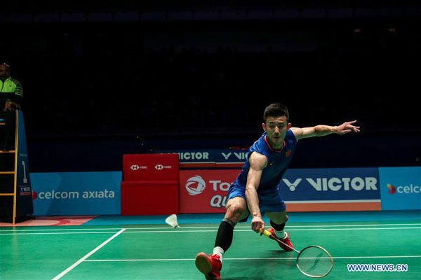 Chen Long of China hits a return during the men's singles final match against Lin Dan of China at the Malaysia Open in Kuala Lumpur, Malaysia, April 7, 2019. Lin Dan claimed the title 2-1. [Photo: Xinhua/Zhu Wei]