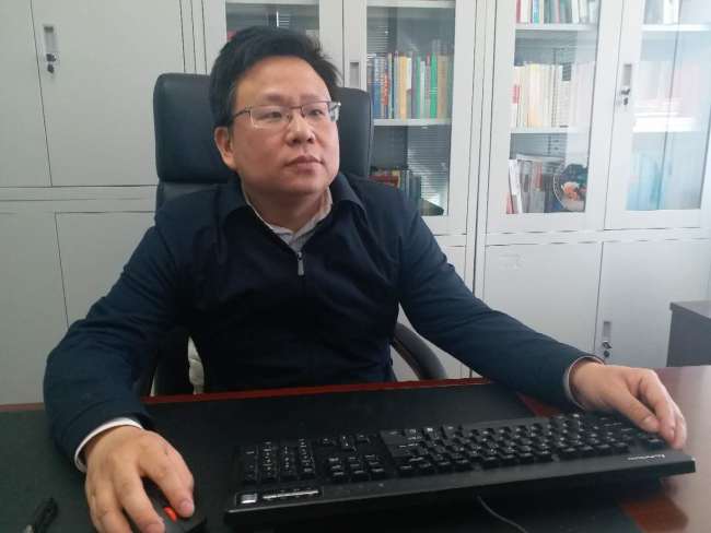 Xu Zhengxiang is general manager of the Strategy and Reform Development Department with the Beijing Public Transport Corporation. [Photo: from China Plus]