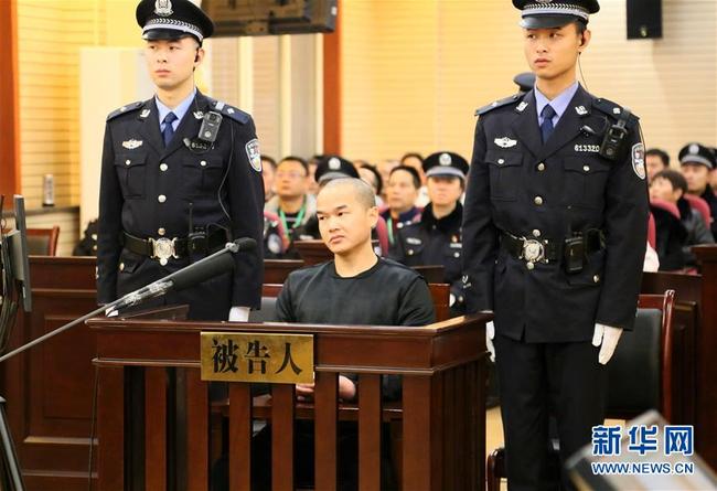 Zhang Koukou is tried at Hanzhong Intermediate People's Court in Shaanxi province on Jan 8. [Photo: Xinhua]