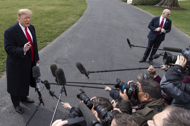 U.S. President Donald Trump talks with reporters as he departs the White House aboard Marine One on Wednesday, March 20, 2019 in Washington, D.C. [File Photo: IC]