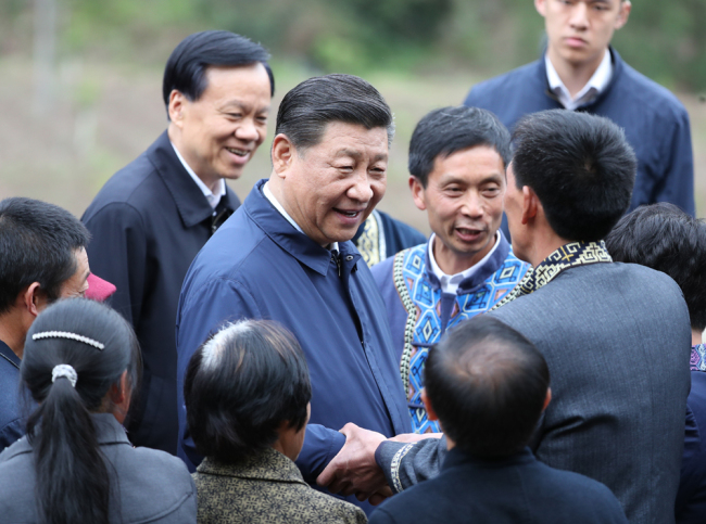 Chinese President Xi Jinping talks with villagers in Huaxi Village of Shizhu Tujia Autonomous County, southwest China's Chongqing, April 15, 2019. Xi went on an inspection tour in southwest China's Chongqing Municipality Monday. [Photo: Xinhua]