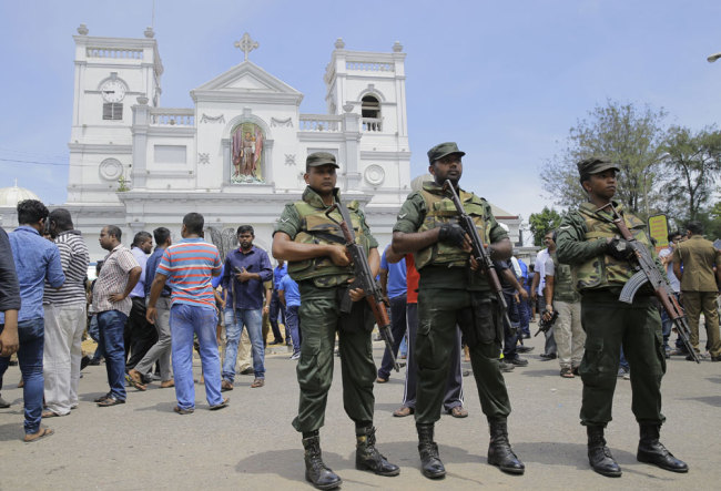 Sri Lankan Army soldiers secure the area around St. Anthony's Shrine after a blast in Colombo, Sri Lanka, Sunday, April 21, 2019. [Photo: AP/Eranga Jayawardena]