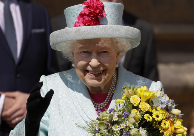 Britain's Queen Elizabeth II waves to the public as she leaves after attending the Easter Mattins Service at St. George's Chapel, at Windsor Castle in England Sunday, April 21, 2019. [Photo: AP]