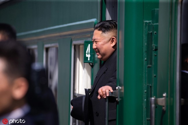 DPRK's top leader Kim Jong Un gets on a train before his departure from a railway station in Vladivostok on April 26, 2019. [Photo: IC]