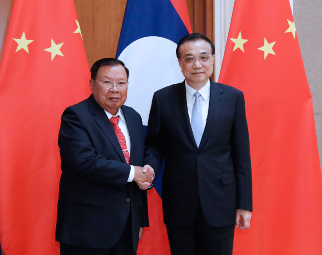 Premier Li Keqiang meets with Lao President Bounnhang Vorachit, also general secretary of the Lao People's Revolutionary Party Central Committee in Beijing, on Thursday, April 25, 2019. [Photo: Xinhua]