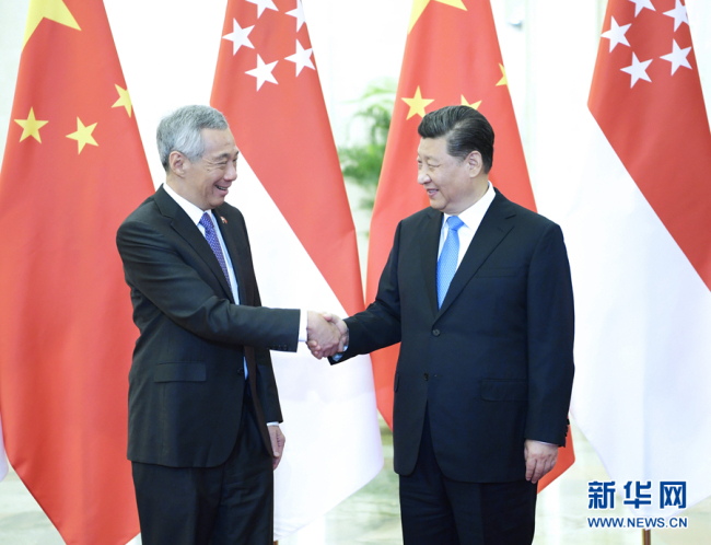 Chinese President Xi Jinping meets with Singapore's Prime Minister Lee Hsien Loong at the Great Hall of the People in Beijing, capital of China, April 29, 2019.[Photo: Xinhua/Li Xueren]